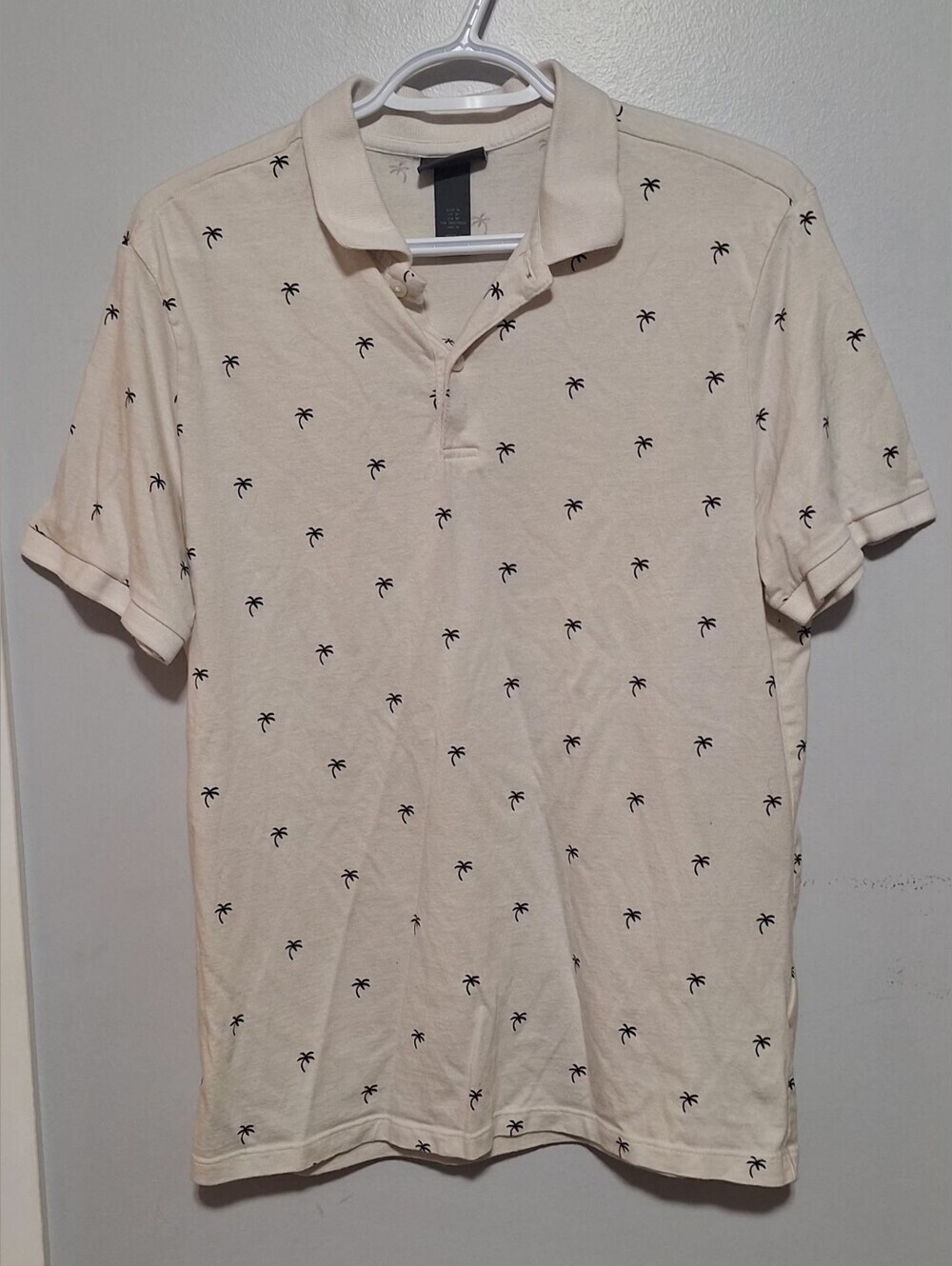 Medium H&M Cream Polo with Tiny Black Palm Print